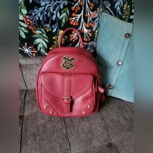 Warner Bros. Red Backpack with Gold Accents